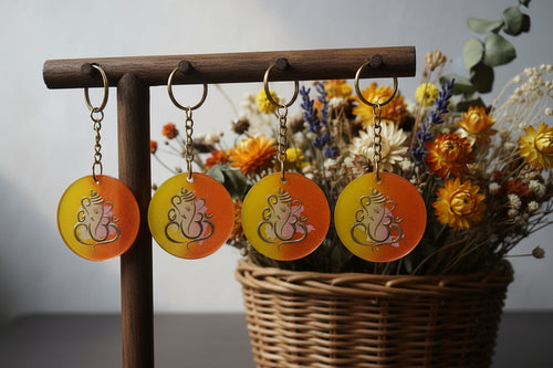 Handcrafted Om Resin Keychain – Spiritual Glow Finish